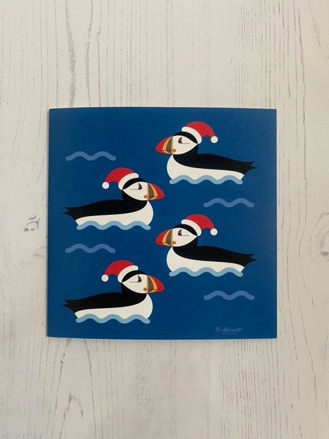 Festive Puffins on the Waves Greeting Card